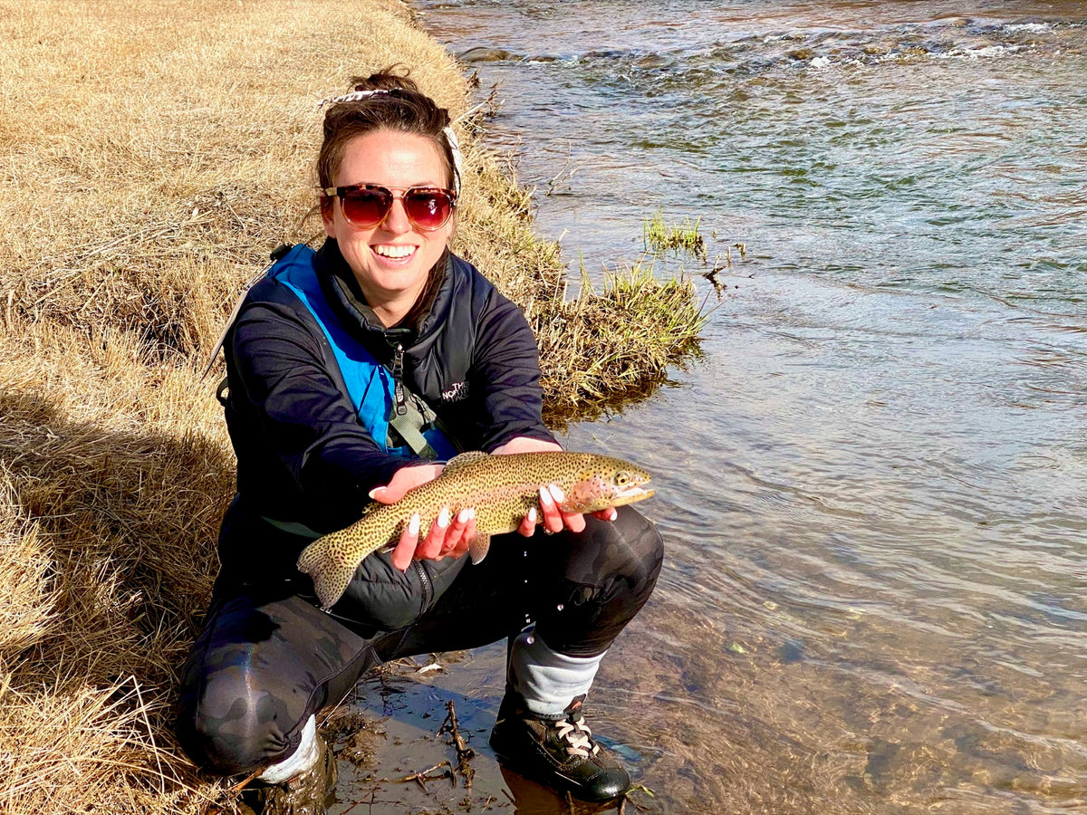 An angler proudly presenting a clear fishing catch